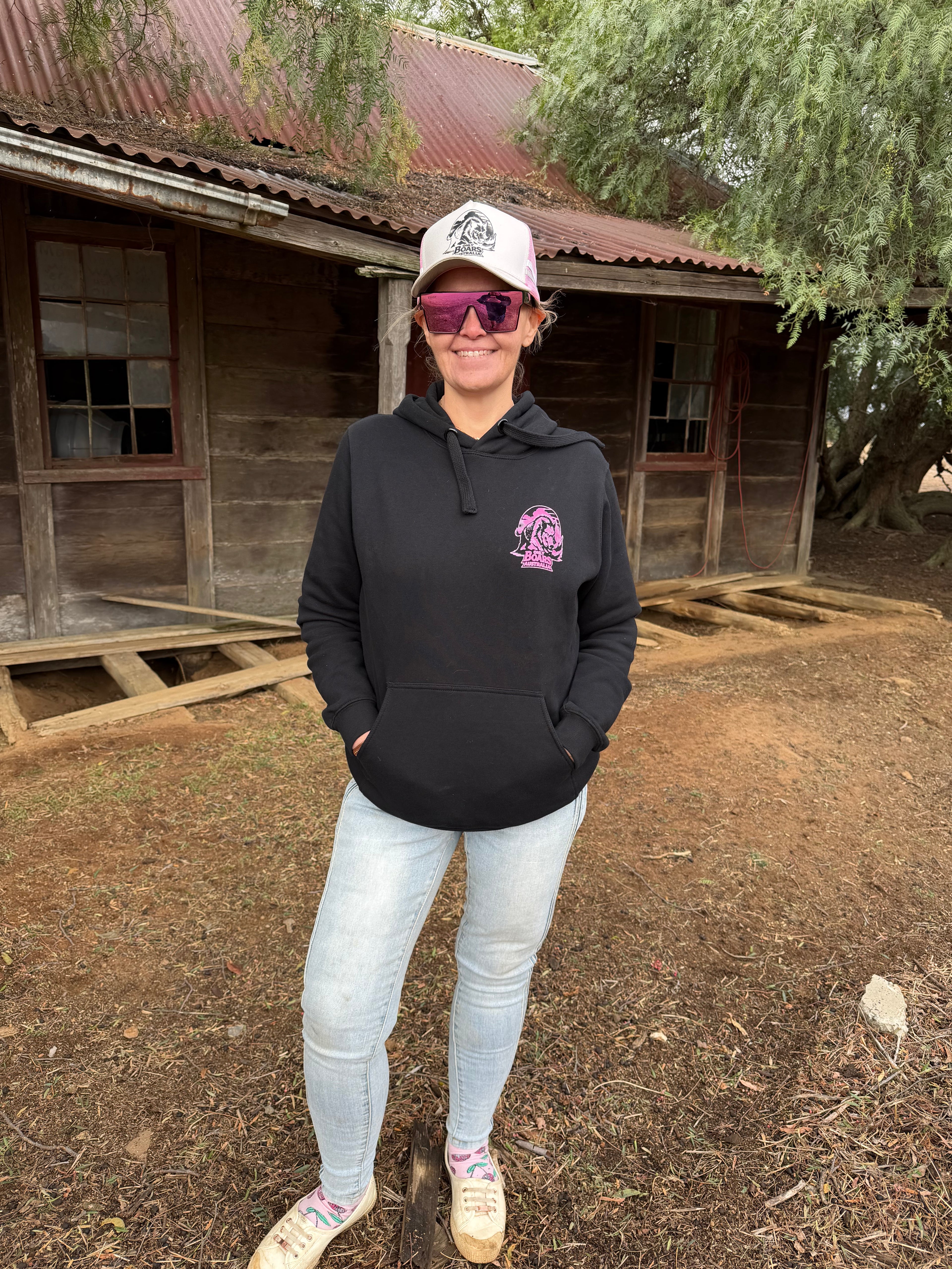 Black hoodie with pink logo