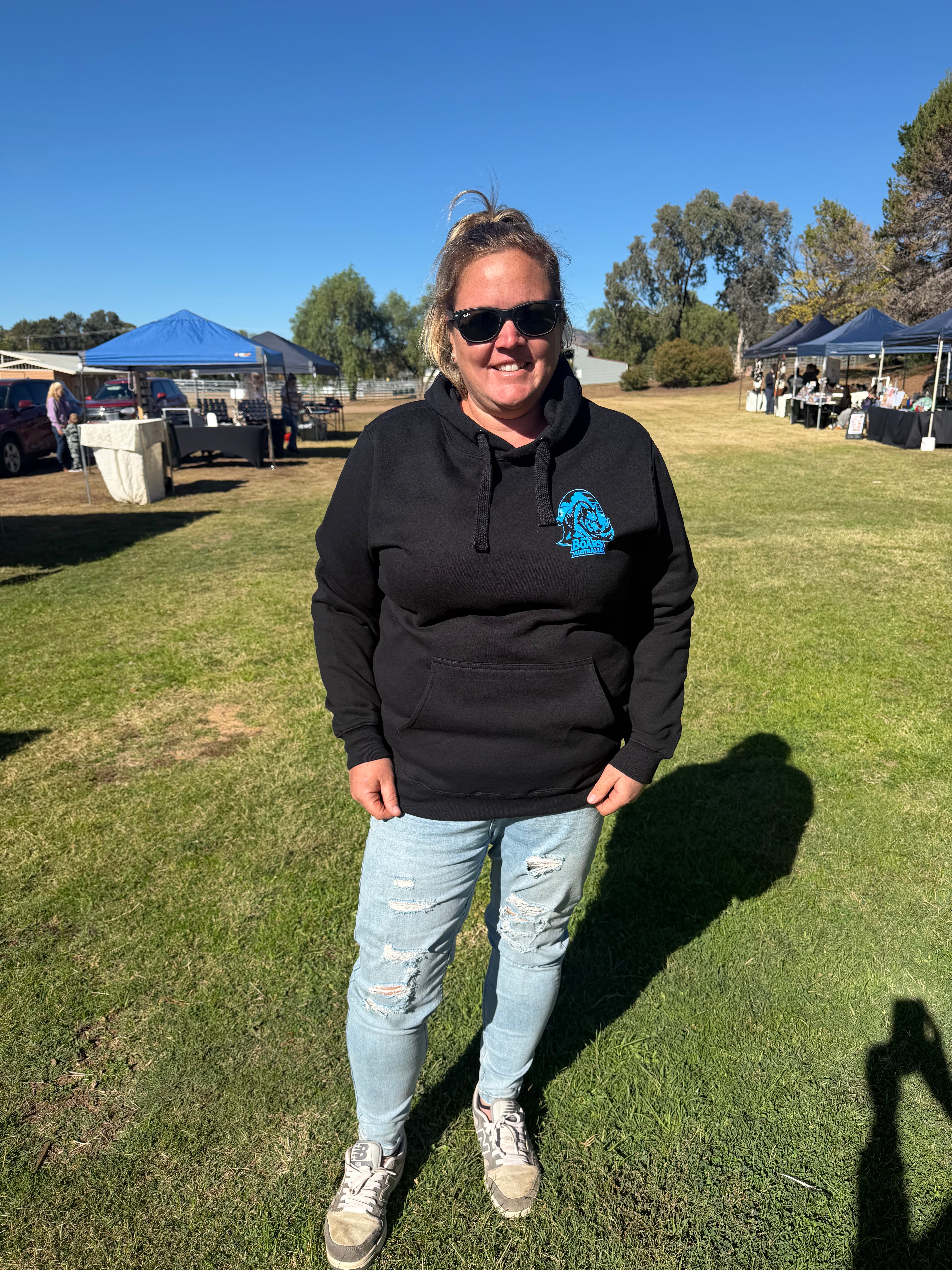 Black hoodie with blue logo